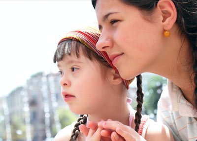 mother with child that has downs syndrome